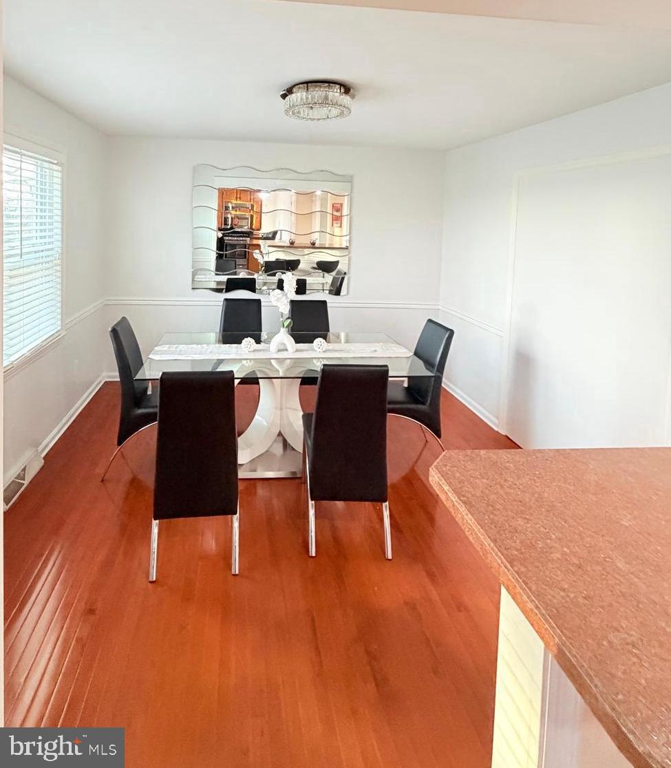 71 Apricot Avenue Leola, PA 17540 - Photo 8 of 30 a dining room with furniture and wooden floor