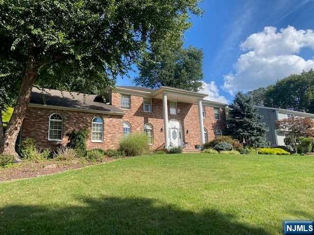 442 Elbert Street Ramsey, NJ 07446 - Photo 2 of 9 a view of a house with a yard