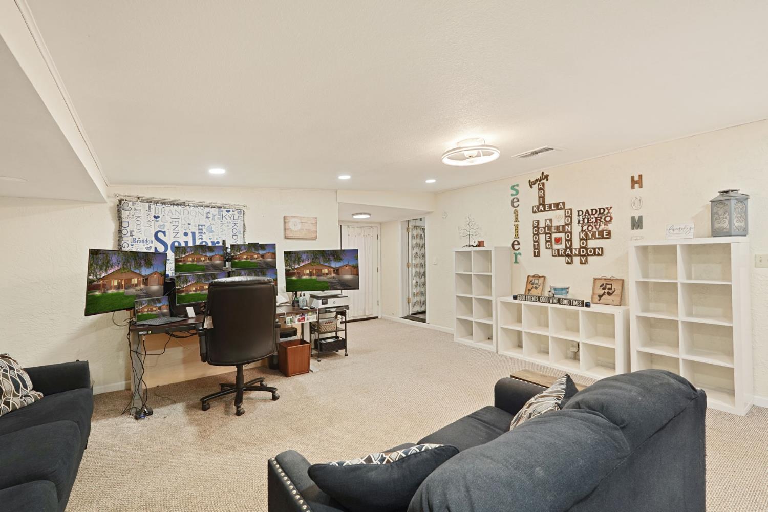 242 3rd Street Galt, CA 95632 - Photo 17 of 31 a view of a livingroom with workspace and a couch