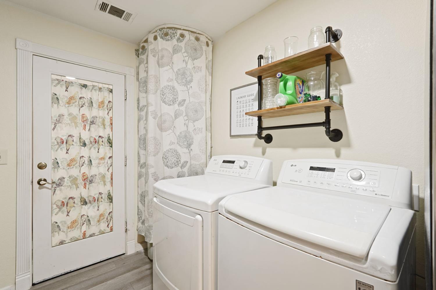 242 3rd Street Galt, CA 95632 - Photo 18 of 31 a utility room with dryer and washer