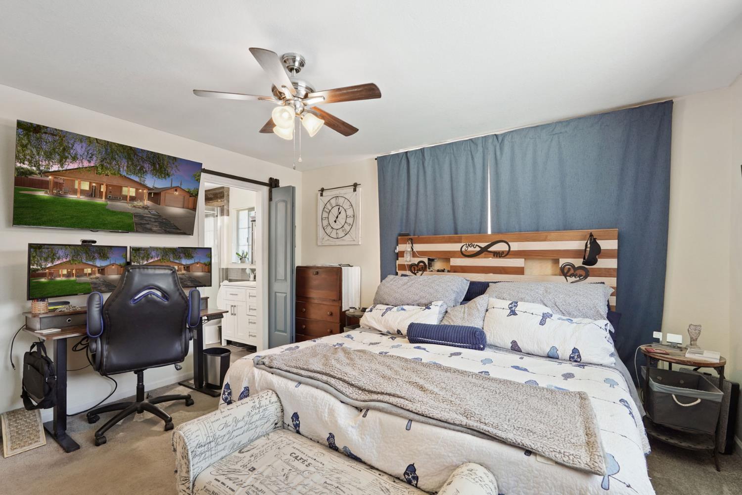 242 3rd Street Galt, CA 95632 - Photo 20 of 31 a bedroom with a bed and a chair