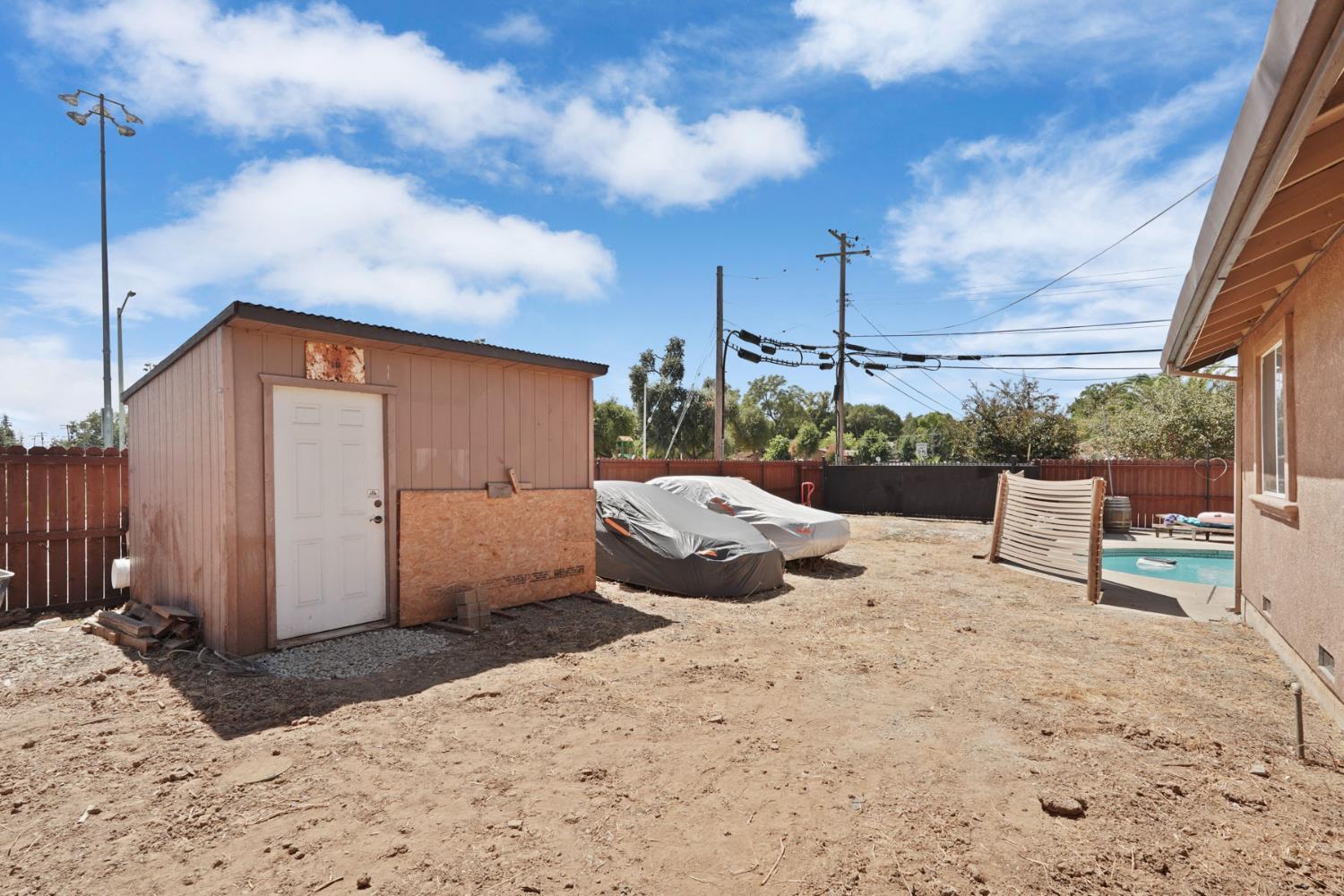 242 3rd Street Galt, CA 95632 - Photo 27 of 31 a view of a backyard with sitting area