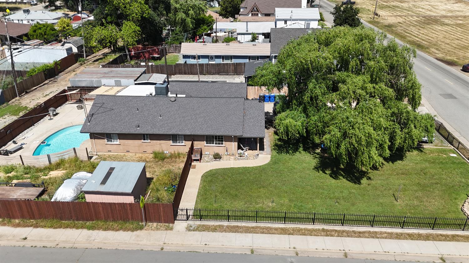 242 3rd Street Galt, CA 95632 - Photo 30 of 31 an aerial view of a house with garden space and street view