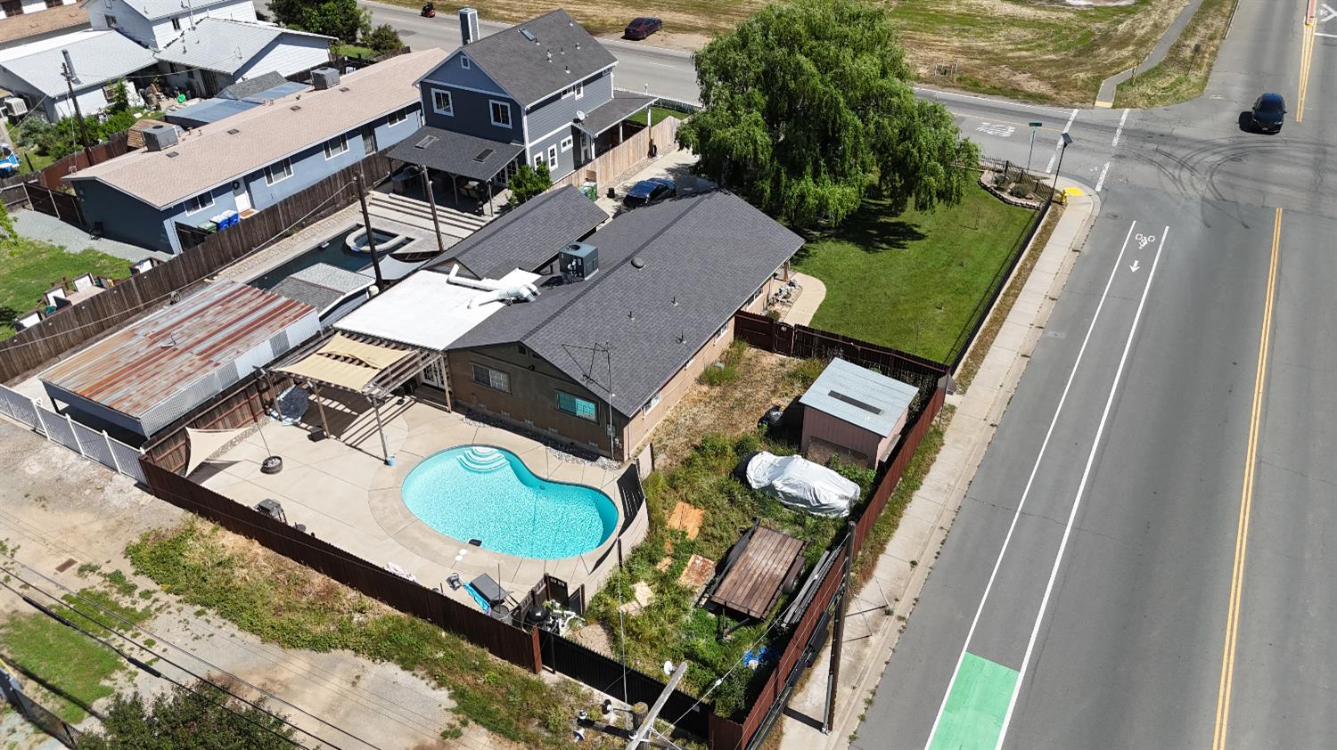 242 3rd Street Galt, CA 95632 - Photo 31 of 31 an aerial view of a house roof deck and outdoor seating