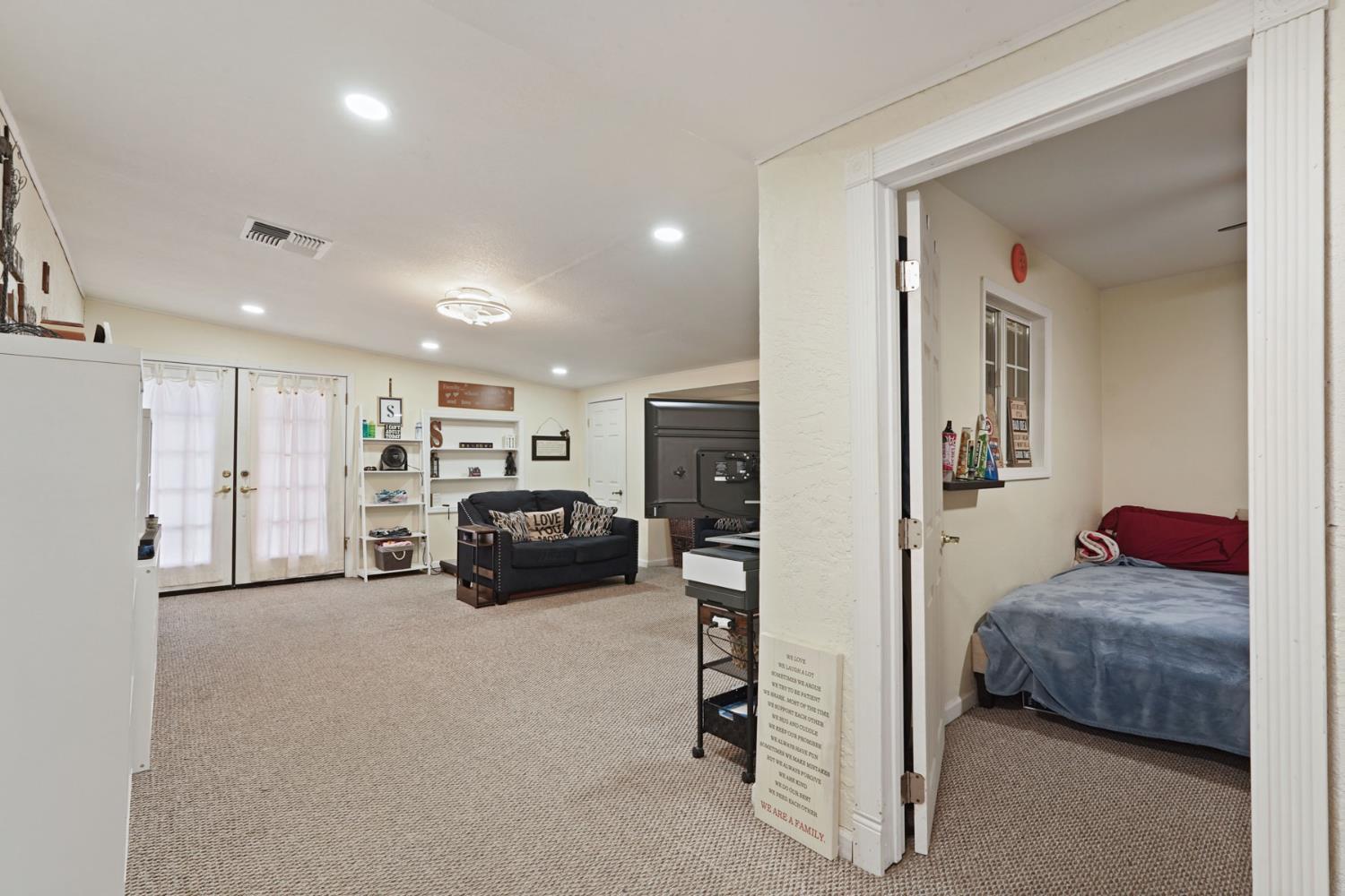 242 3rd Street Galt, CA 95632 - Photo 10 of 31 a living room with furniture and a couch