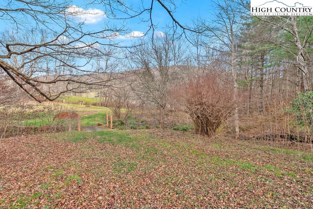 9716 3 Top Road Todd, NC 28684 - Photo 12 of 23 a view of a yard