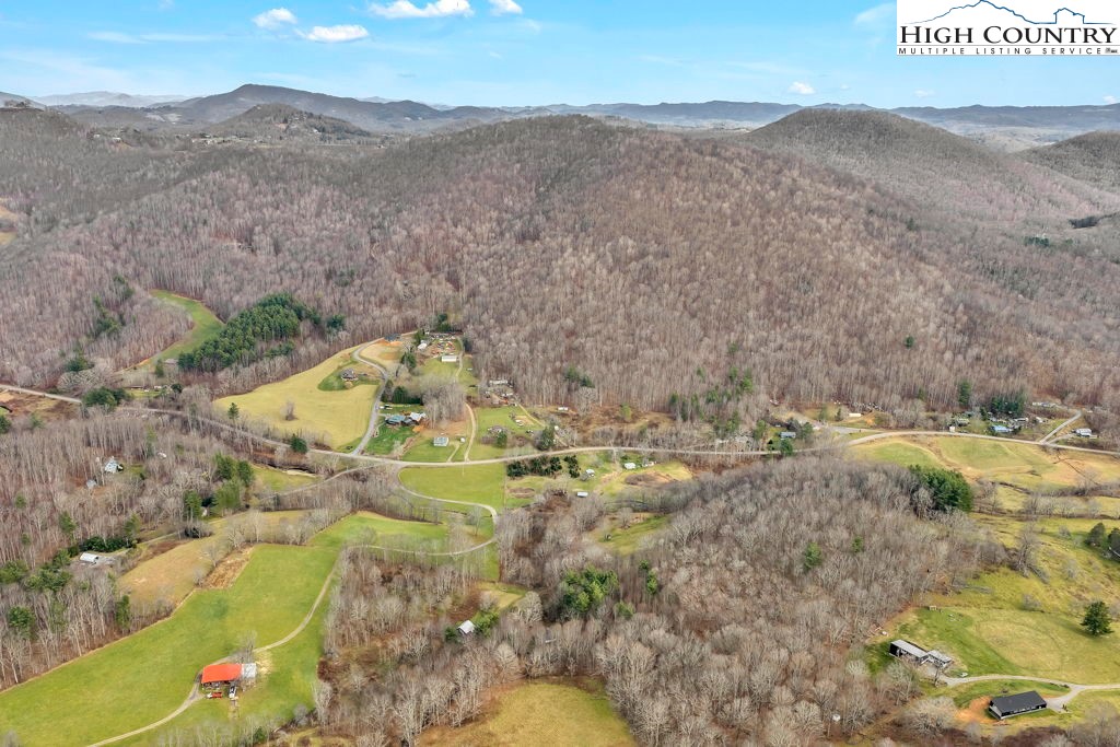 9716 3 Top Road Todd, NC 28684 - Photo 21 of 23 a view of a yard with mountain