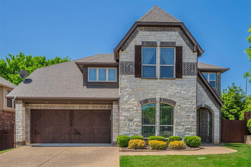 3011 Starlight Court Euless, TX 76039 - Photo 1 of 1 a front view of a house with garden