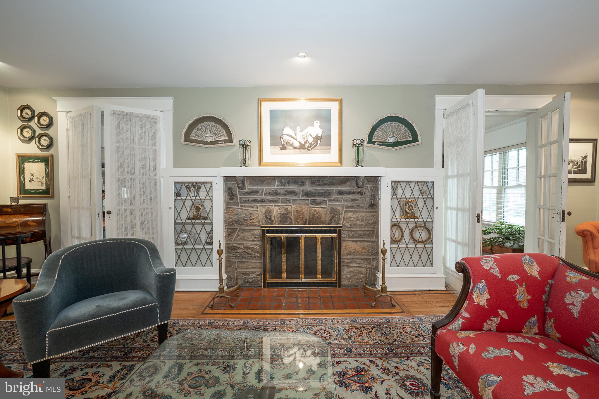 9 Shirley Road Narberth, PA 19072 - Photo 14 of 87 a living room with furniture and a fireplace