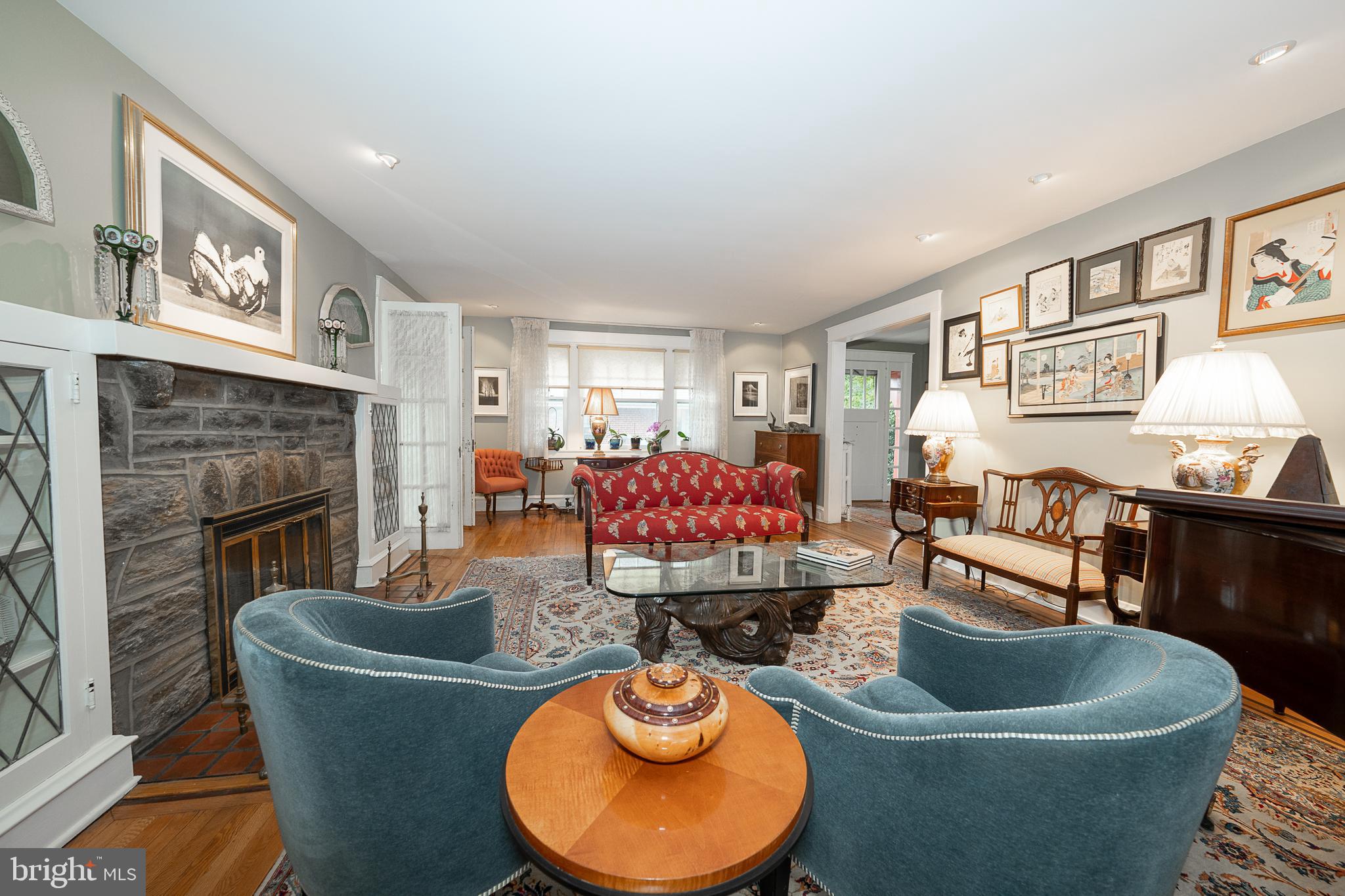 9 Shirley Road Narberth, PA 19072 - Photo 15 of 87 a living room with furniture and a fireplace