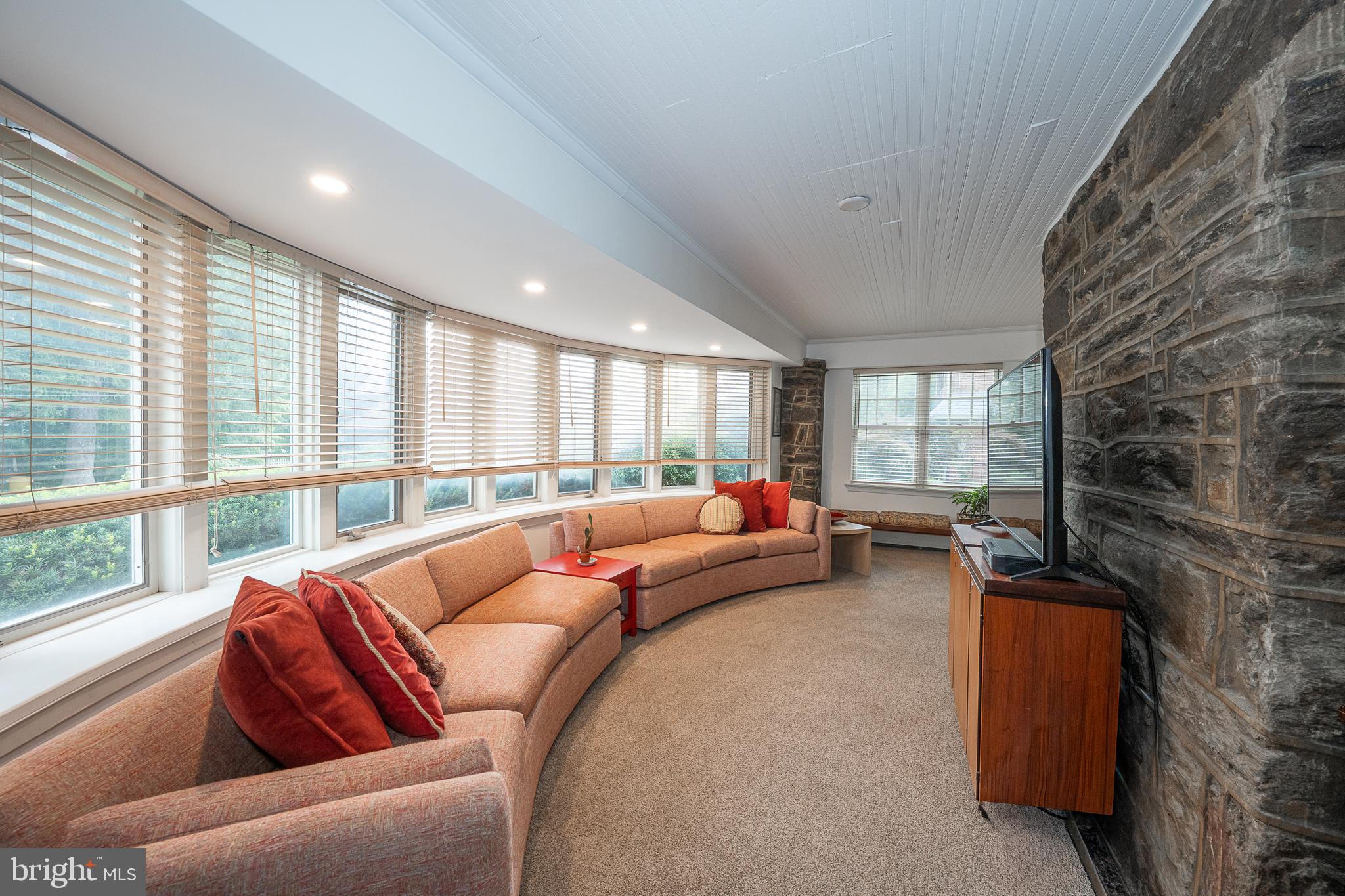 9 Shirley Road Narberth, PA 19072 - Photo 18 of 87 a living room with furniture and a floor to ceiling window