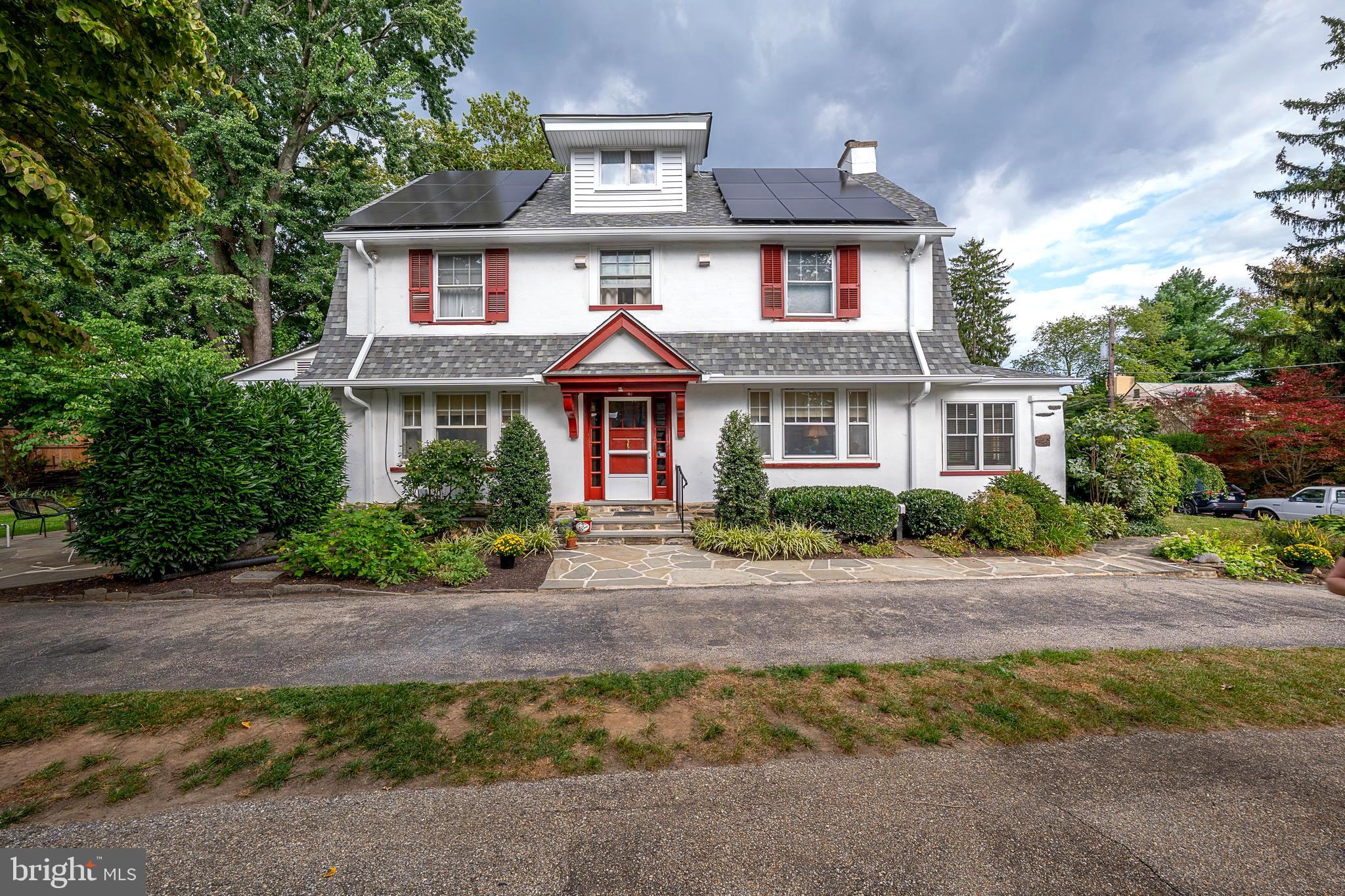 9 Shirley Road Narberth, PA 19072 - Photo 5 of 87 a front view of a house with a garden