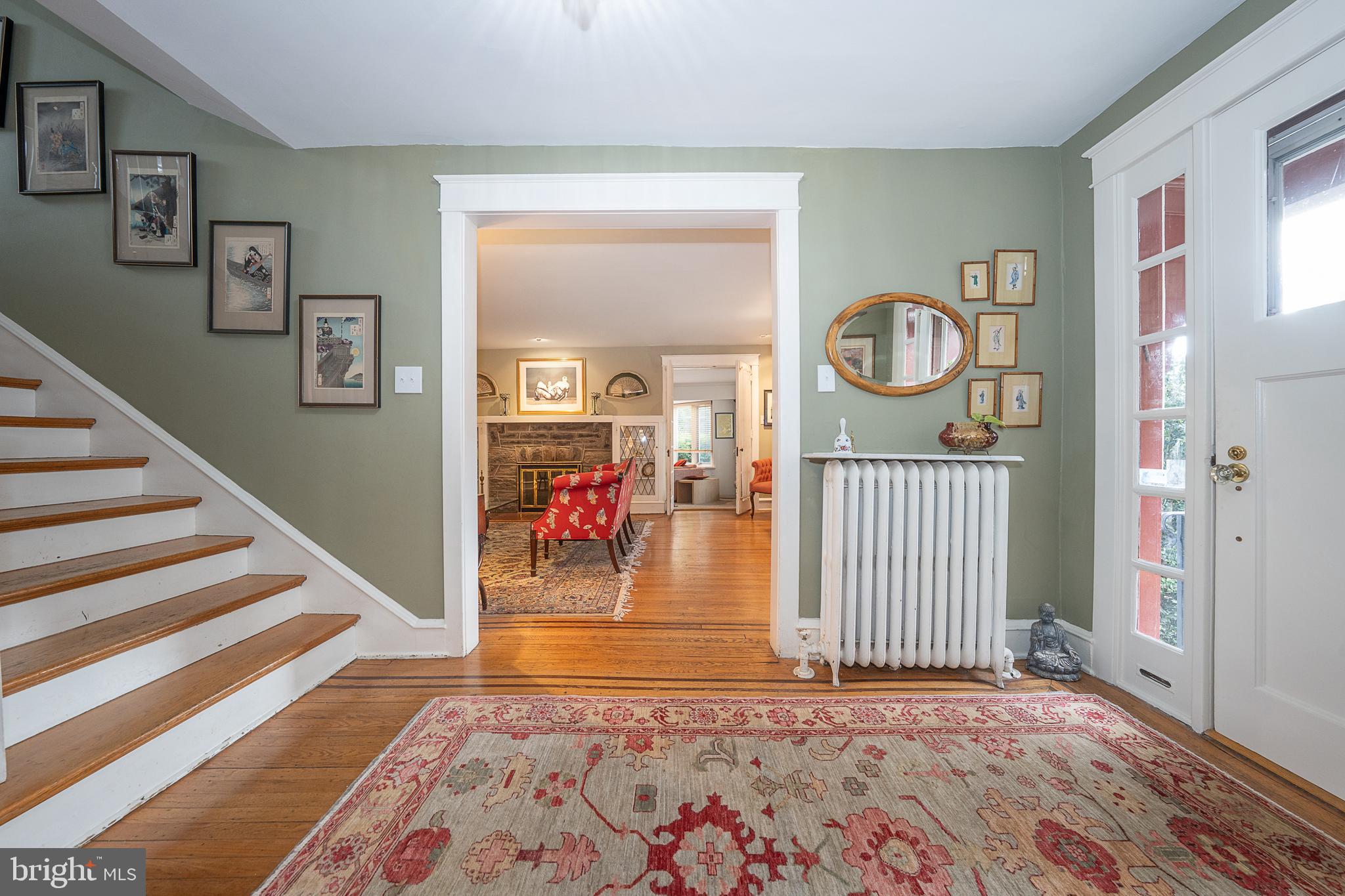9 Shirley Road Narberth, PA 19072 - Photo 10 of 87 a view of a hallway with wooden floor and a rug