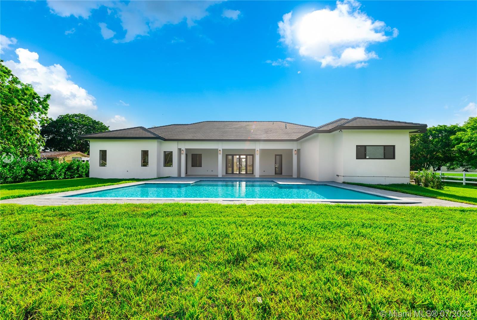 6122 Southwest 173rd Way Southwest Ranches, FL 33331 - Photo 28 of 29 a view of a house with a backyard