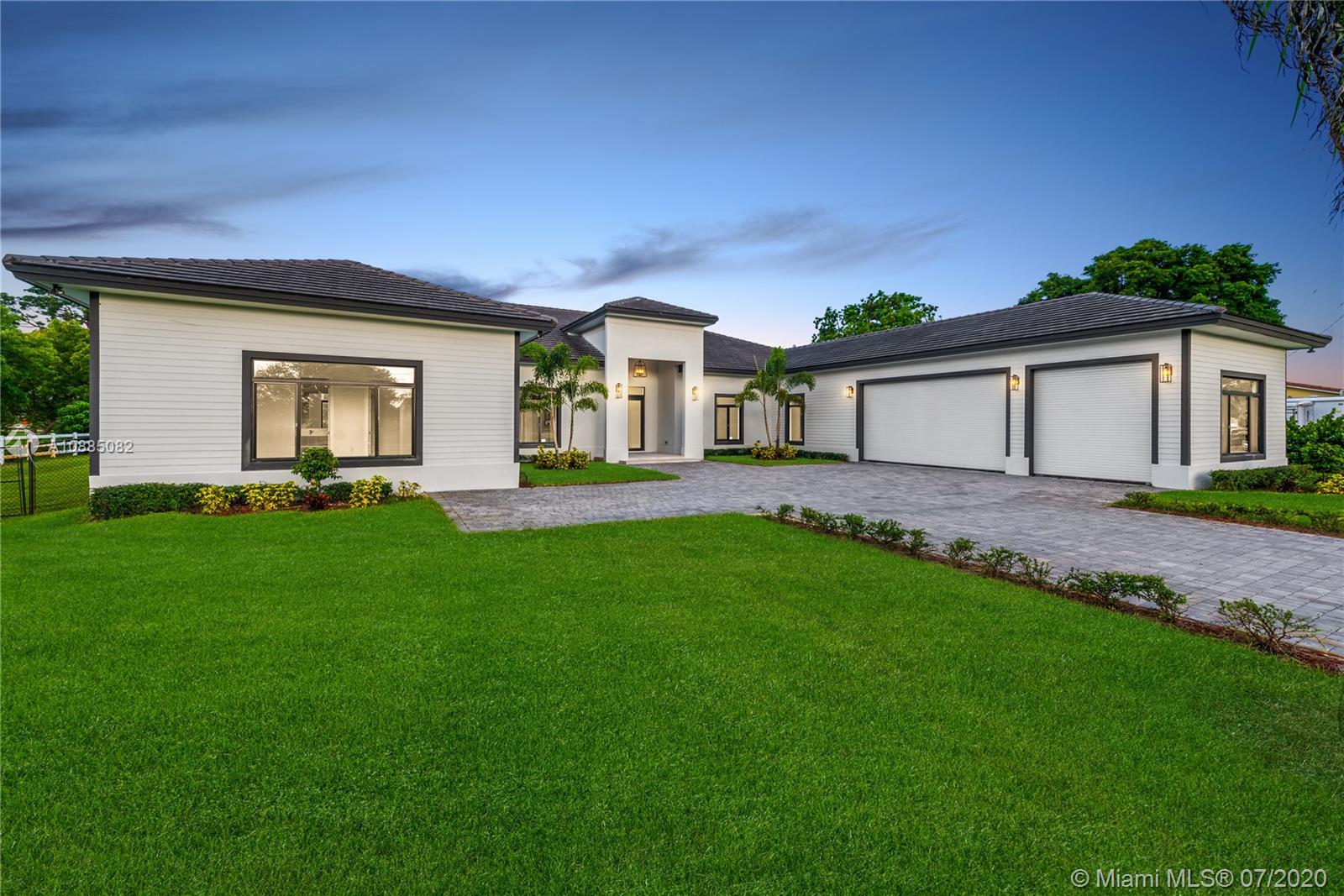 6122 Southwest 173rd Way Southwest Ranches, FL 33331 - Photo 4 of 29 a front view of house with yard and green space
