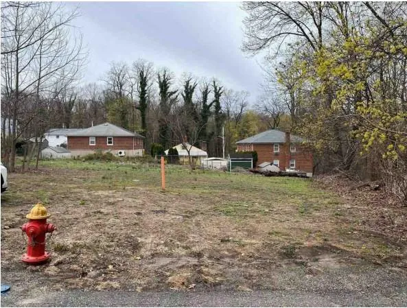 a childrens park with lots of trees