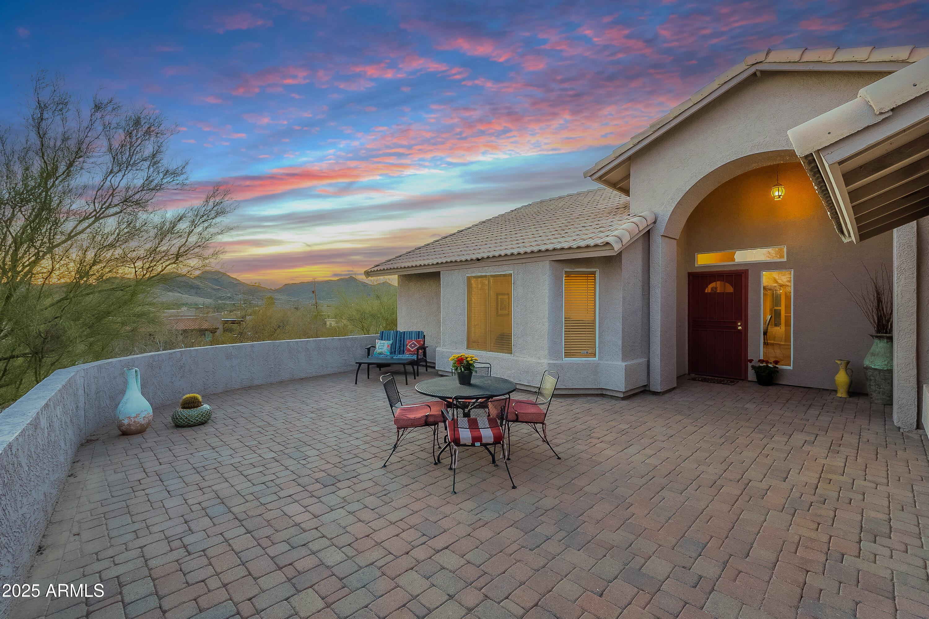5960 East Grapevine Road Cave Creek, AZ 85331 - Photo 1 of 54 a view of a lounge chair in the terrace