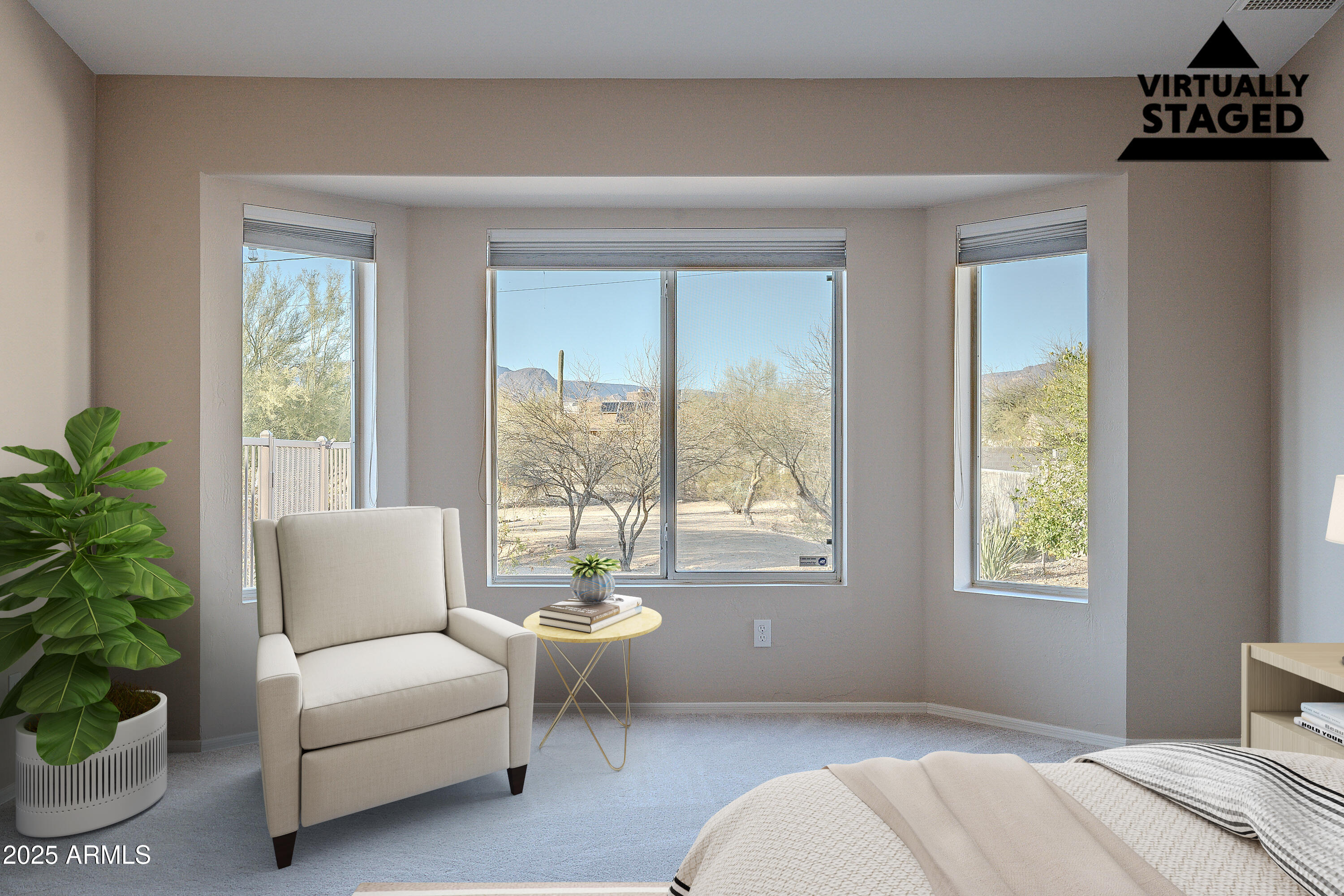 5960 East Grapevine Road Cave Creek, AZ 85331 - Photo 11 of 54 a bedroom with a balcony a bed and a couch