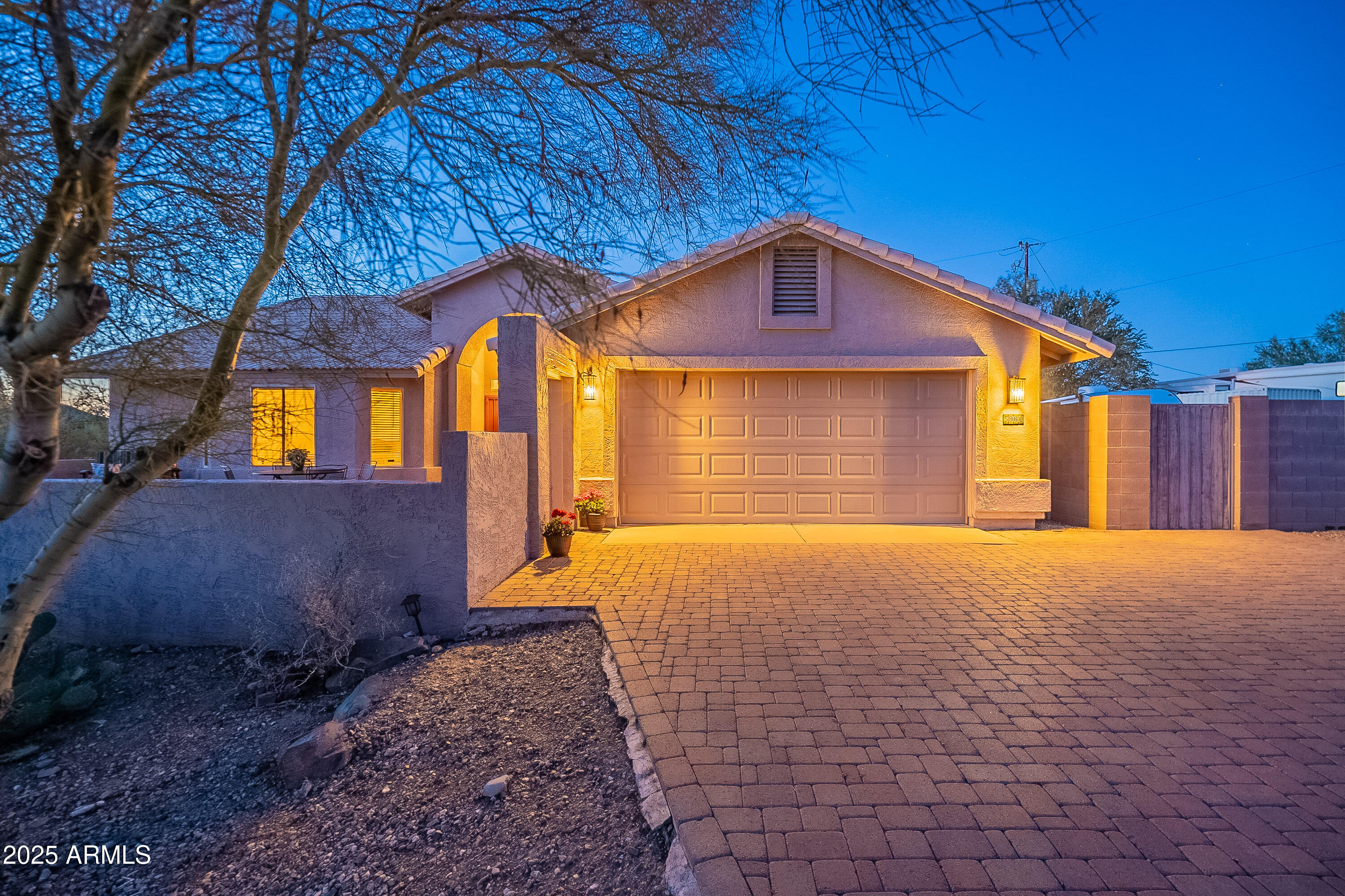 5960 East Grapevine Road Cave Creek, AZ 85331 - Photo 18 of 54 a view of a house with backyard and garage