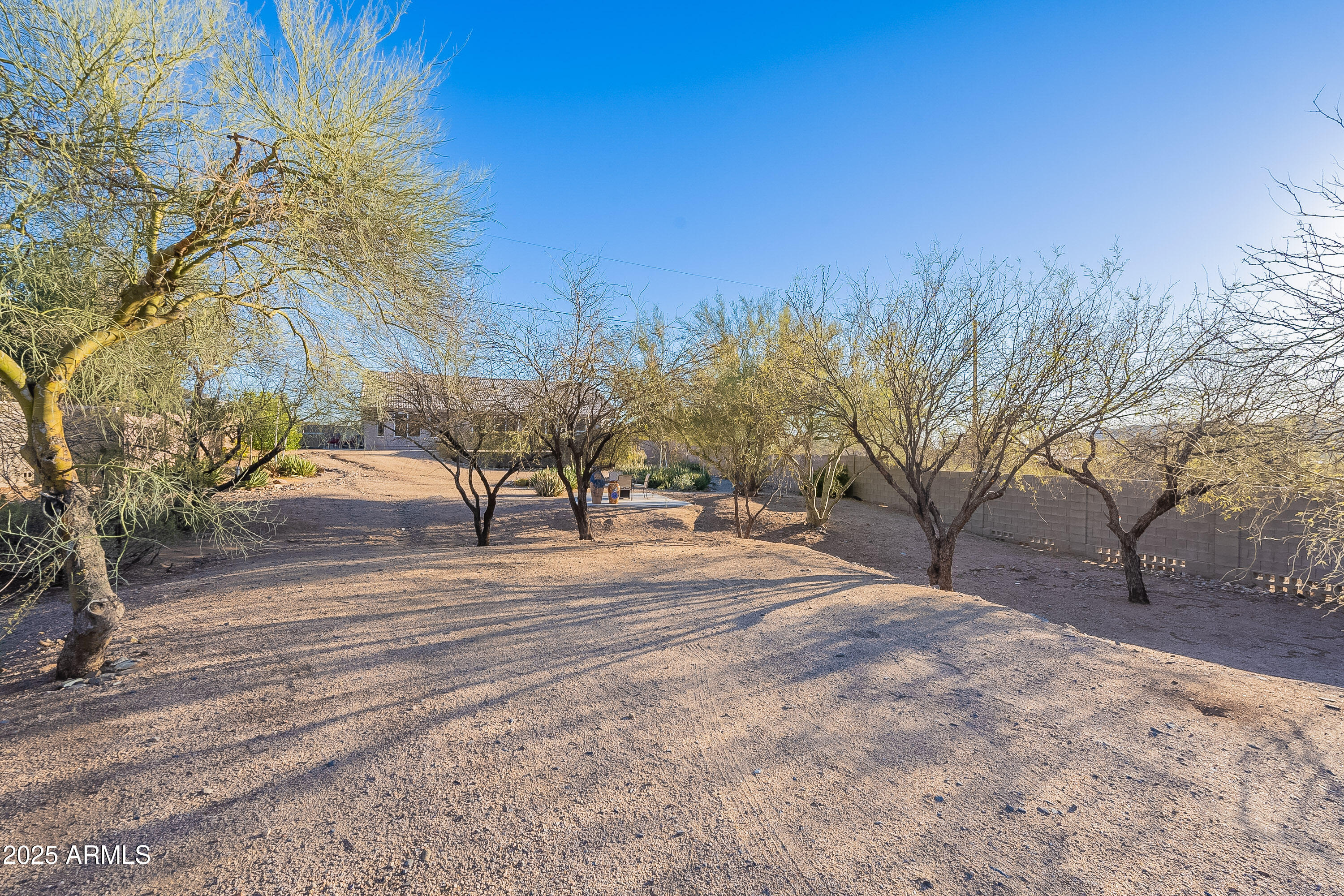 5960 East Grapevine Road Cave Creek, AZ 85331 - Photo 38 of 54 a view of a backyard of the house