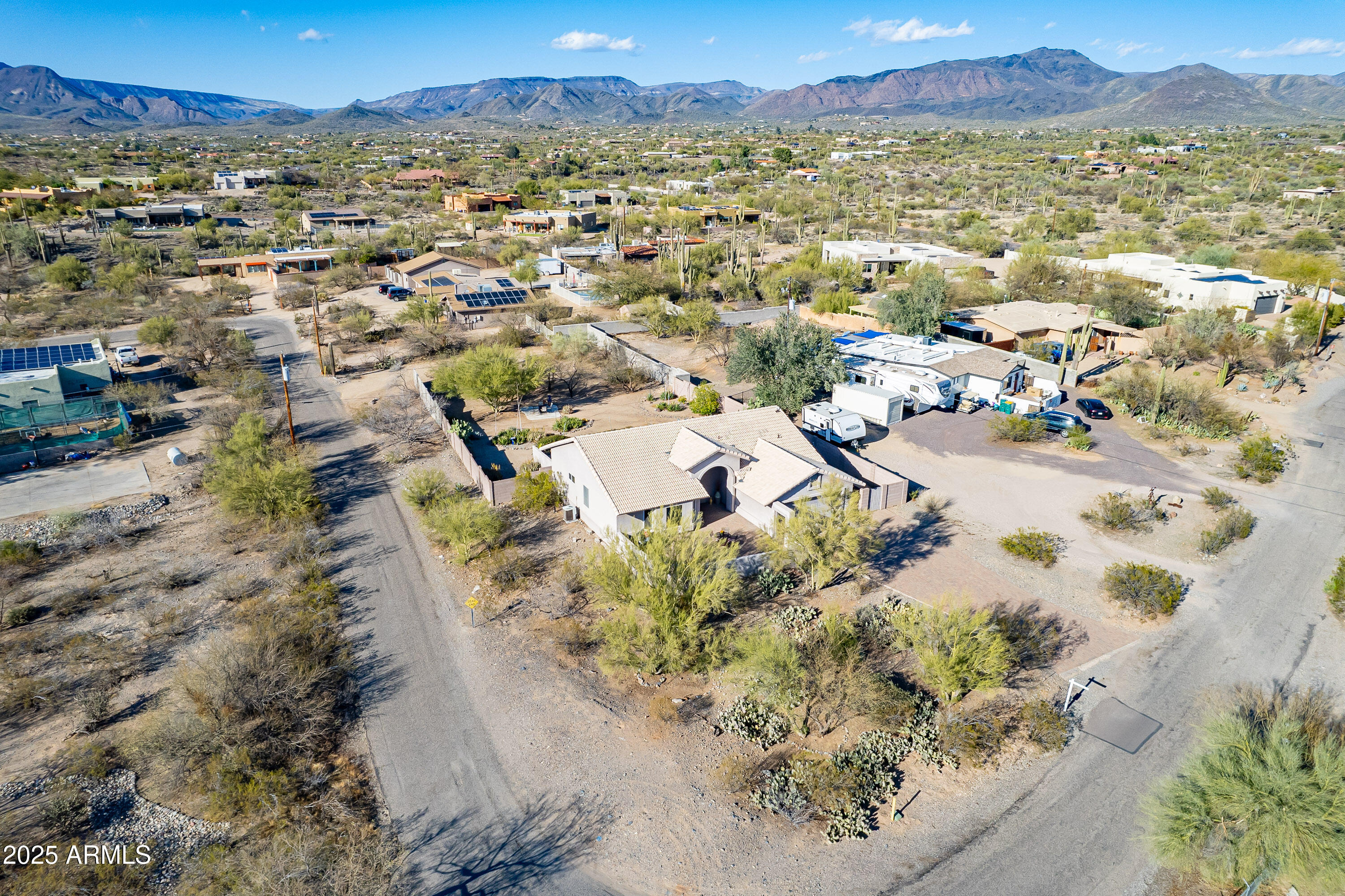 5960 East Grapevine Road Cave Creek, AZ 85331 - Photo 42 of 54 an aerial view of residential houses with outdoor space