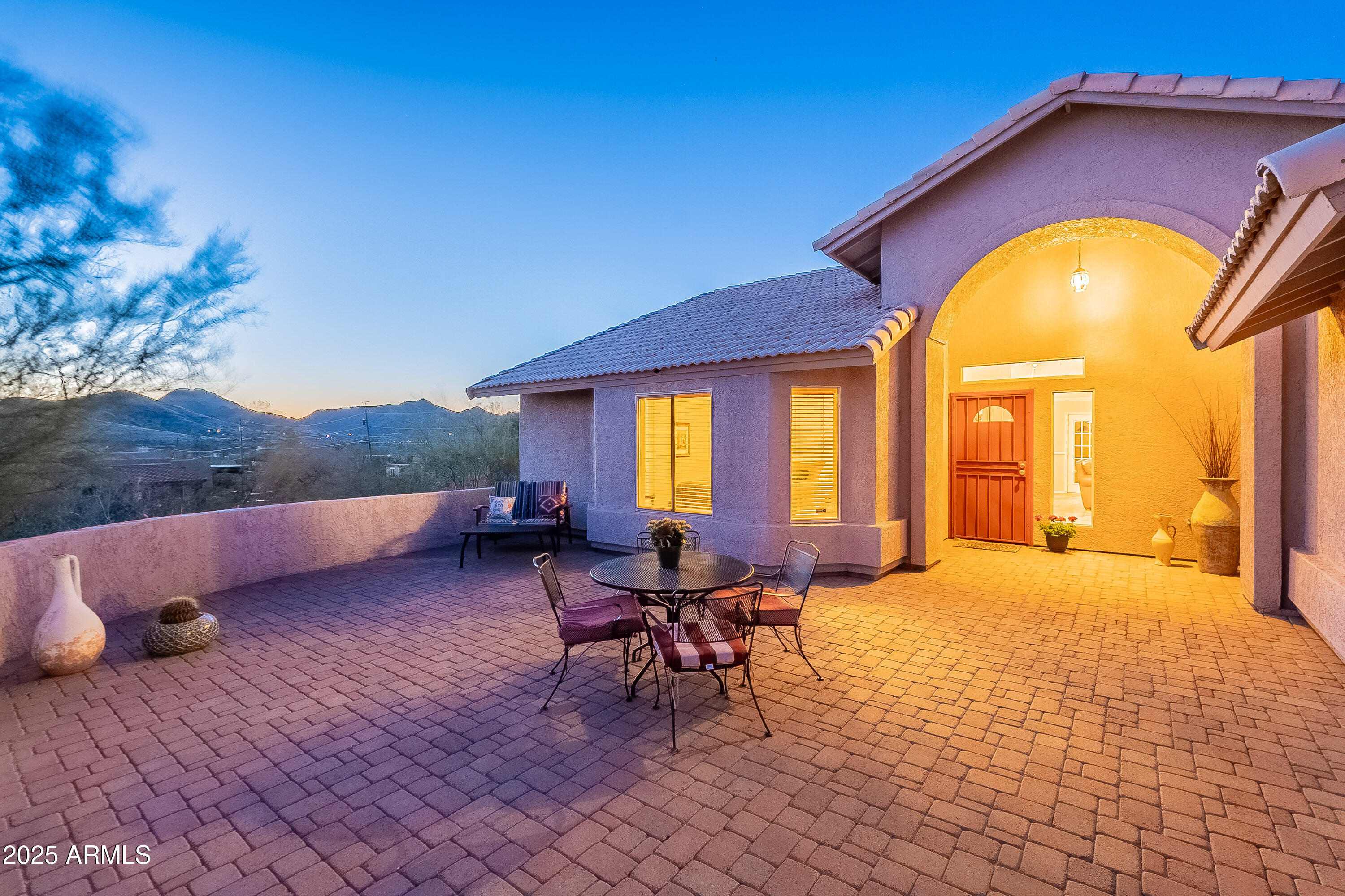 5960 East Grapevine Road Cave Creek, AZ 85331 - Photo 50 of 54 a view of a house with swimming pool and sitting area