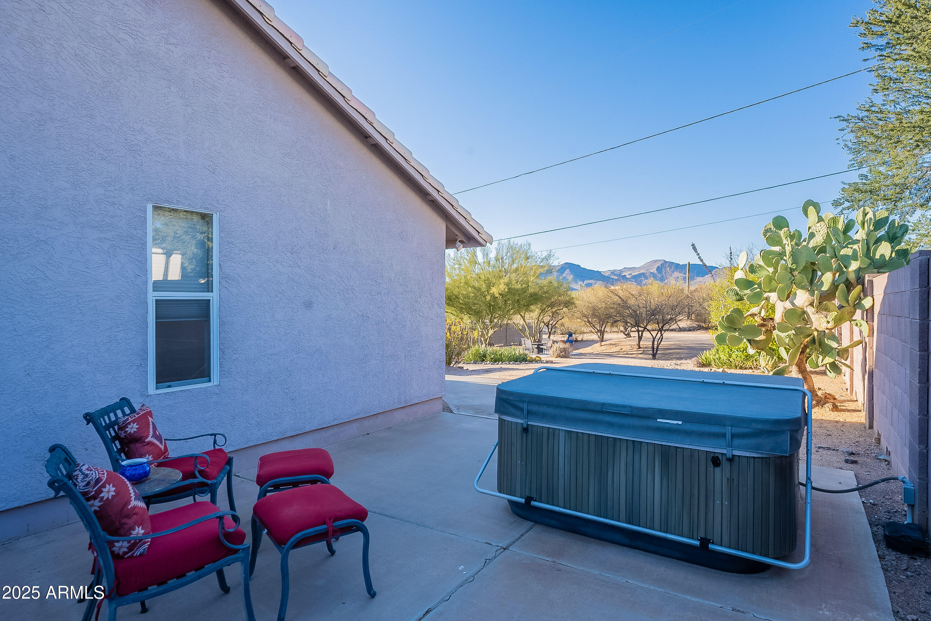 5960 East Grapevine Road Cave Creek, AZ 85331 - Photo 53 of 54 a wooden bench sitting in front of a building