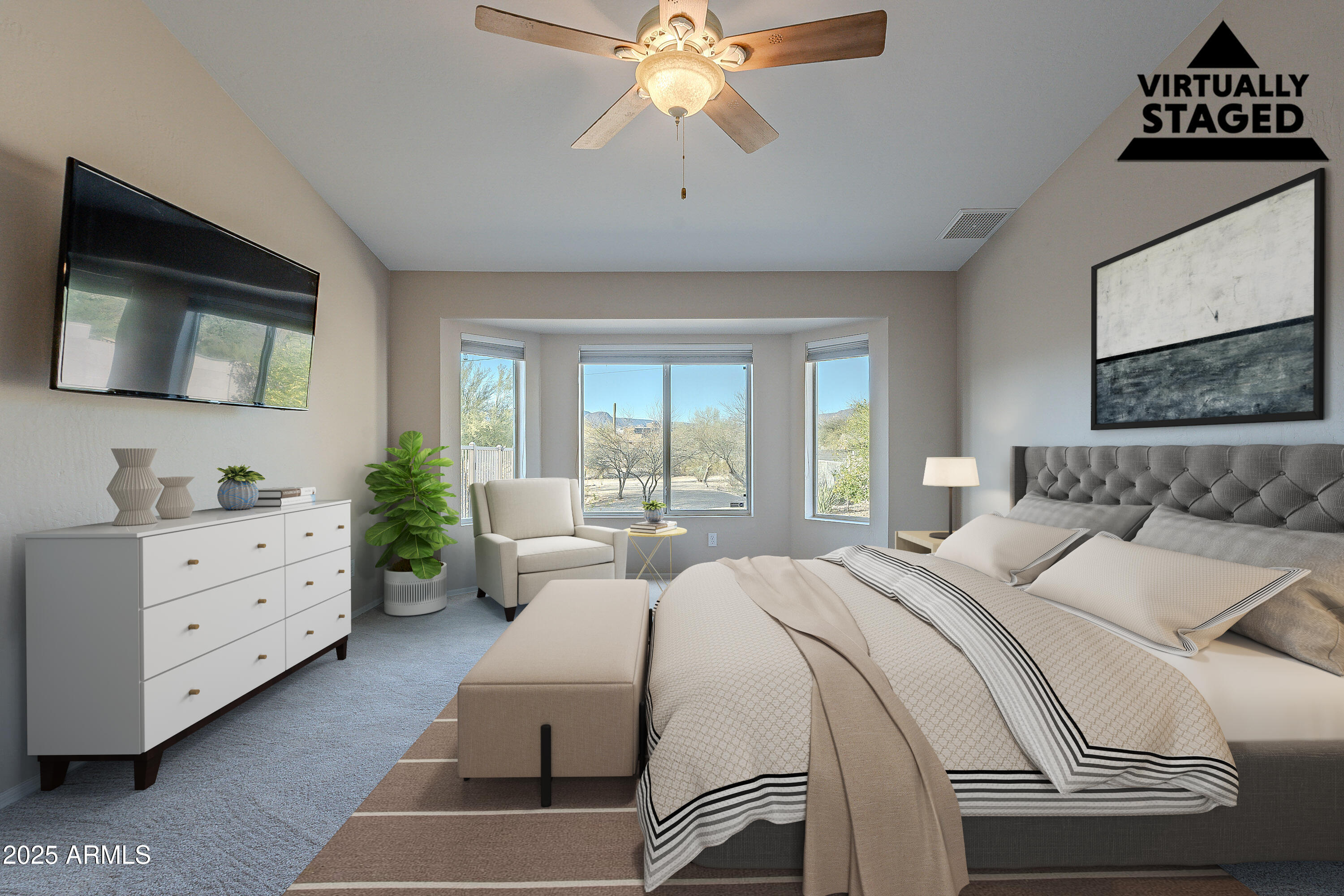 5960 East Grapevine Road Cave Creek, AZ 85331 - Photo 10 of 54 a bed room with a bed and a chandelier