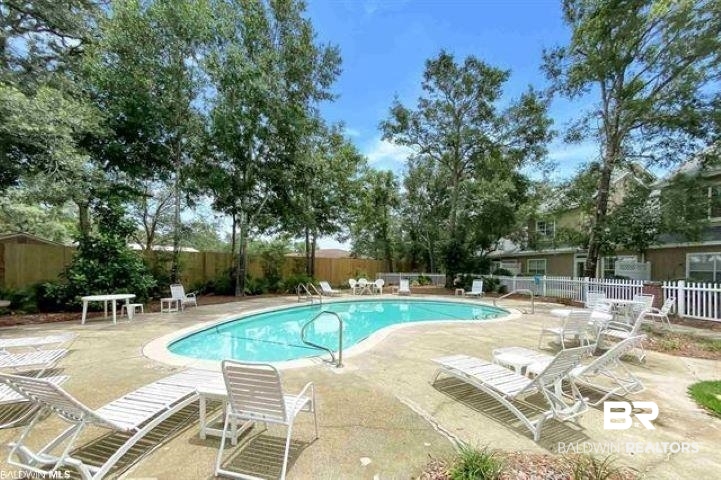 430 West Fort Morgan Road, Unit 1902 Gulf Shores, AL 36542 - Photo 44 of 59 View of swimming pool featuring a patio