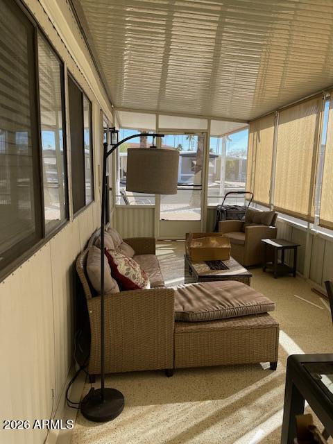 303 South Recker Road Mesa, AZ 85206 - Photo 22 of 28 a living room with furniture and a flat screen tv
