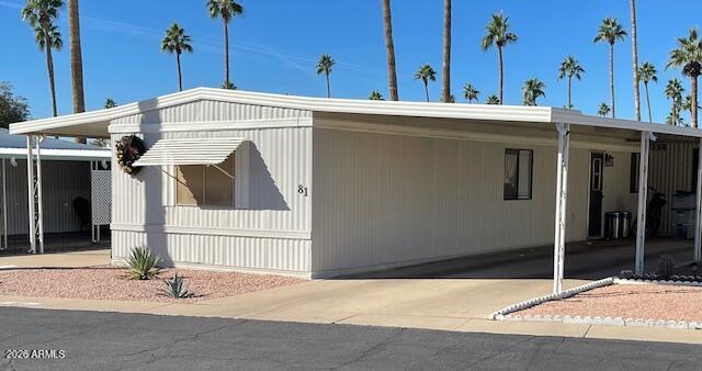 303 South Recker Road Mesa, AZ 85206 - Photo 25 of 28 front right, carport