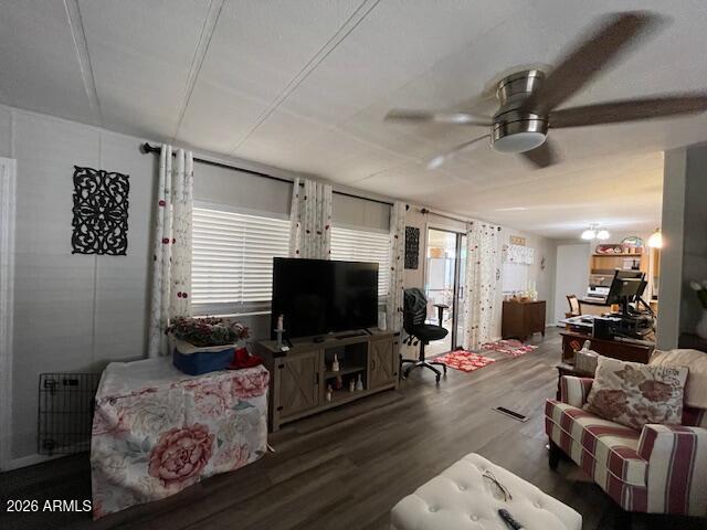 303 South Recker Road Mesa, AZ 85206 - Photo 8 of 28 a living room with furniture and a flat screen tv