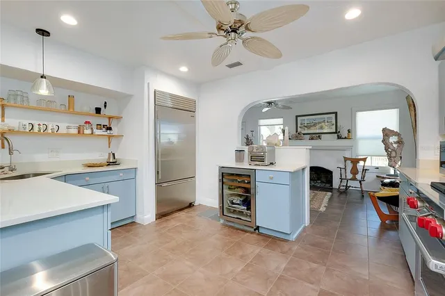 a bathroom with a sink mirror and toilet