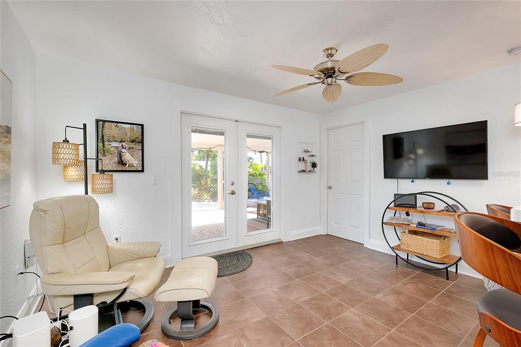 223 Palmetto Road West Nokomis, FL 34275 - Photo 24 of 100 a living room with furniture and a flat screen tv
