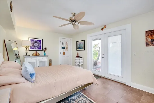 a view of a porch with chairs and backyard