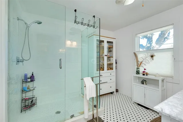 a view of a house with swimming pool and a yard