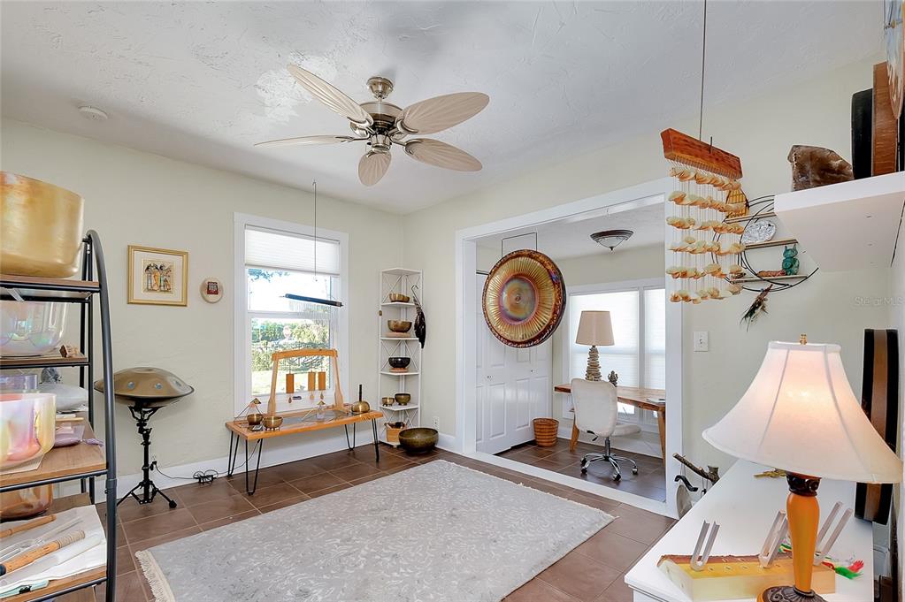 223 Palmetto Road West Nokomis, FL 34275 - Photo 47 of 100 a living room with furniture and a window