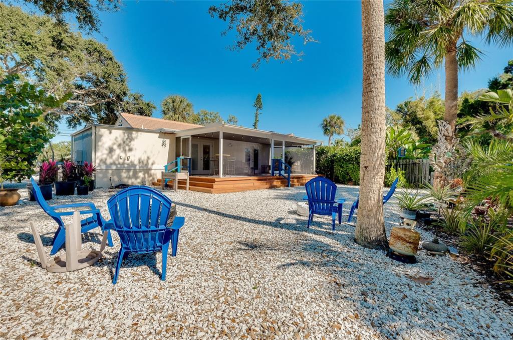 223 Palmetto Road West Nokomis, FL 34275 - Photo 63 of 100 a view of a chairs and tables in the patio