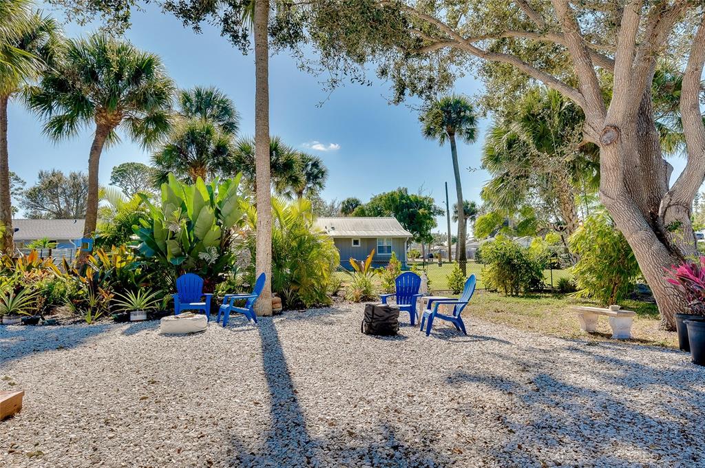 223 Palmetto Road West Nokomis, FL 34275 - Photo 65 of 100 a view of a house with backyard and sitting area