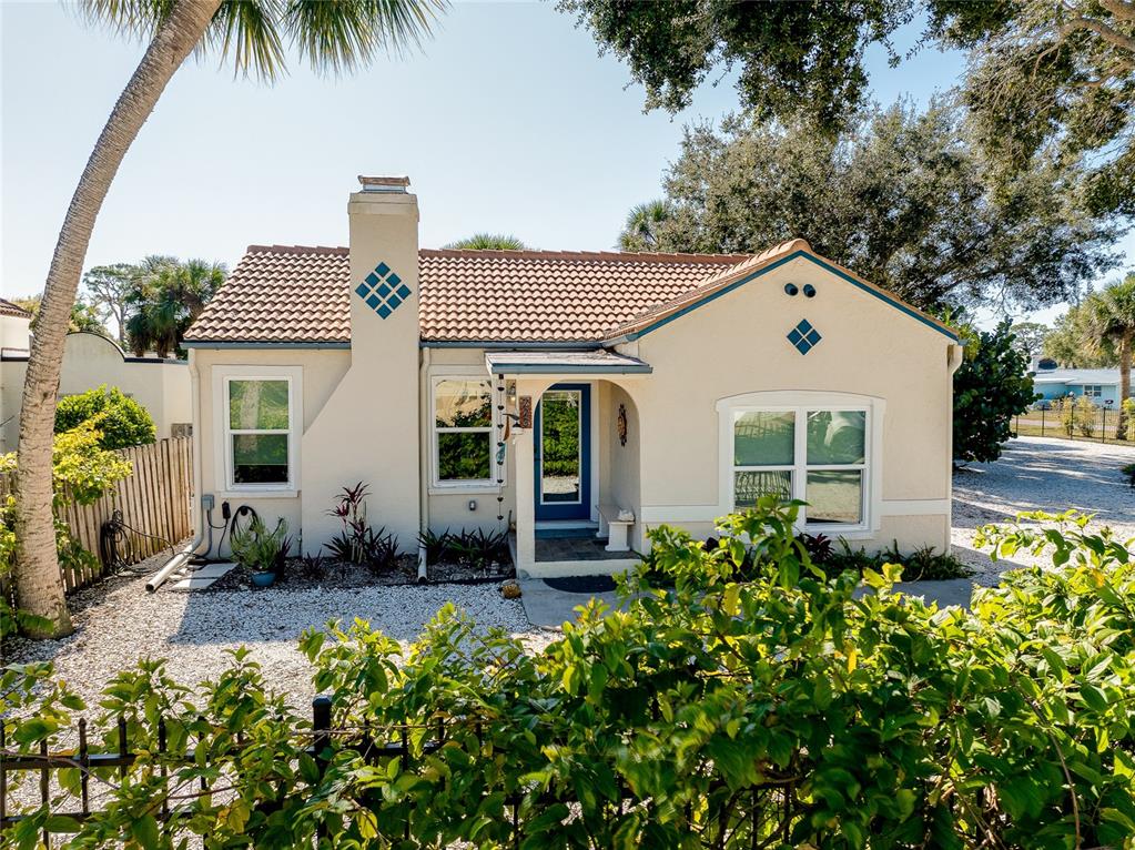 223 Palmetto Road West Nokomis, FL 34275 - Photo 93 of 100 front view of a house with a yard
