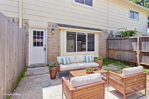 an aerial view of a house with a garden