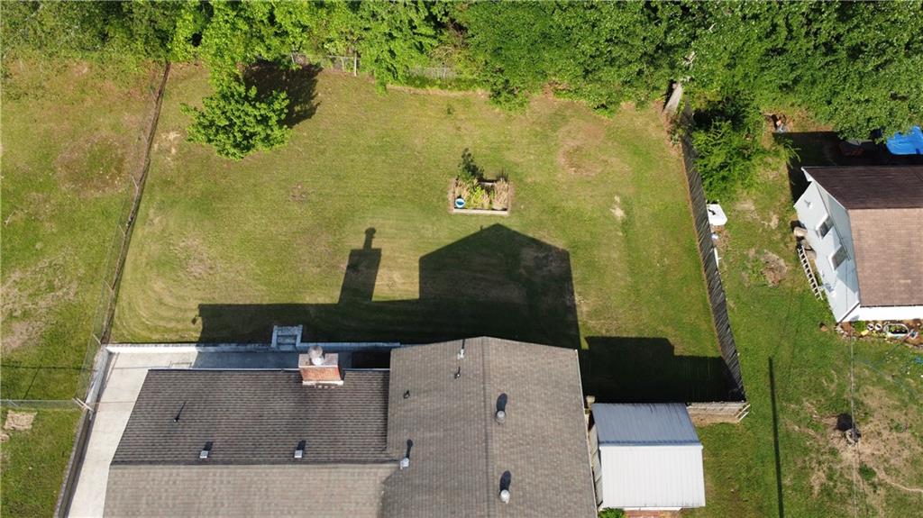 52 Lyons Drive Northwest Rome, GA 30165 - Photo 31 of 34 an aerial view of a house with a yard
