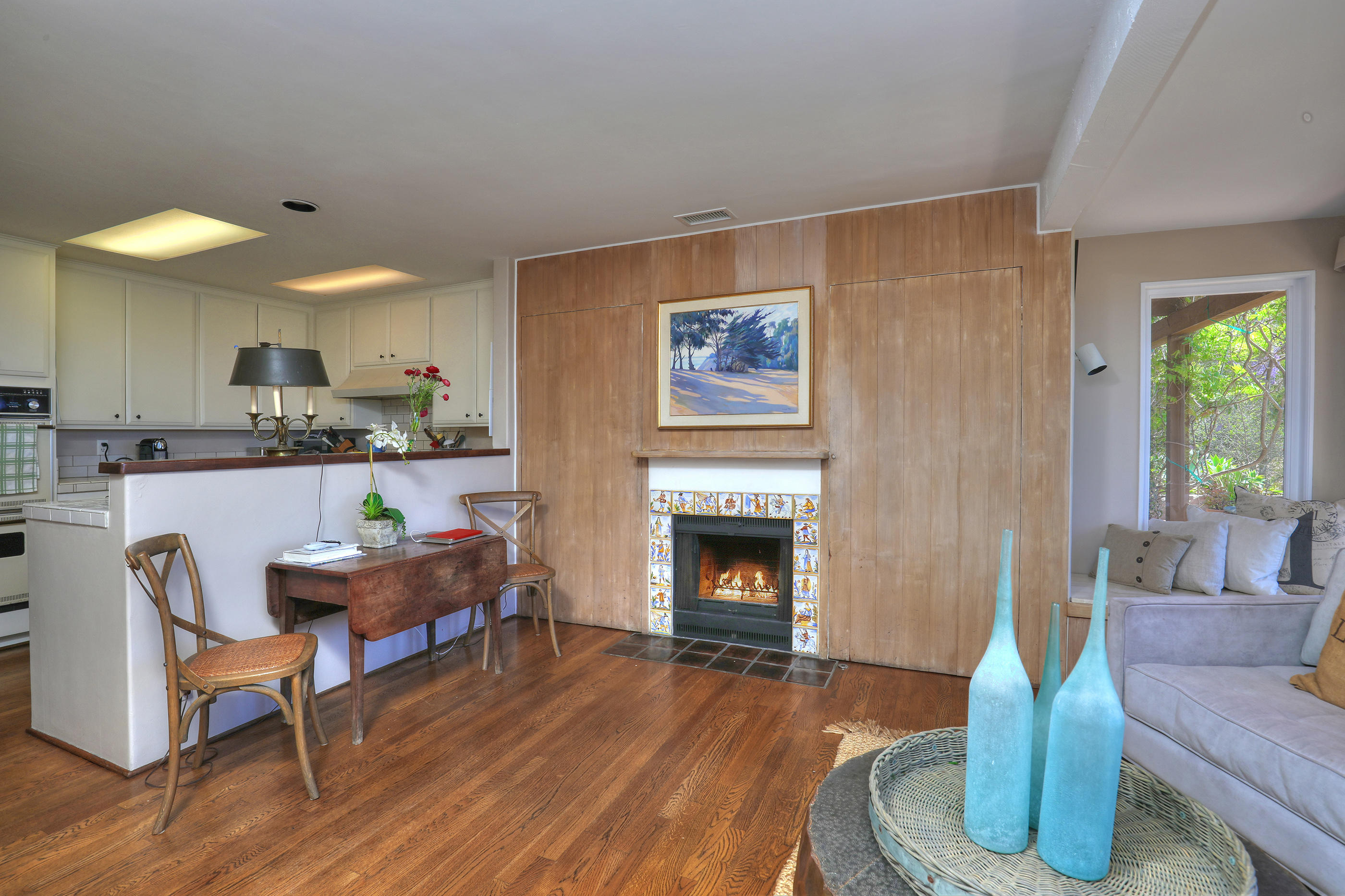 1986 Arriba Street Carpinteria, CA 93013 - Photo 13 of 35 a living room with furniture and a fireplace