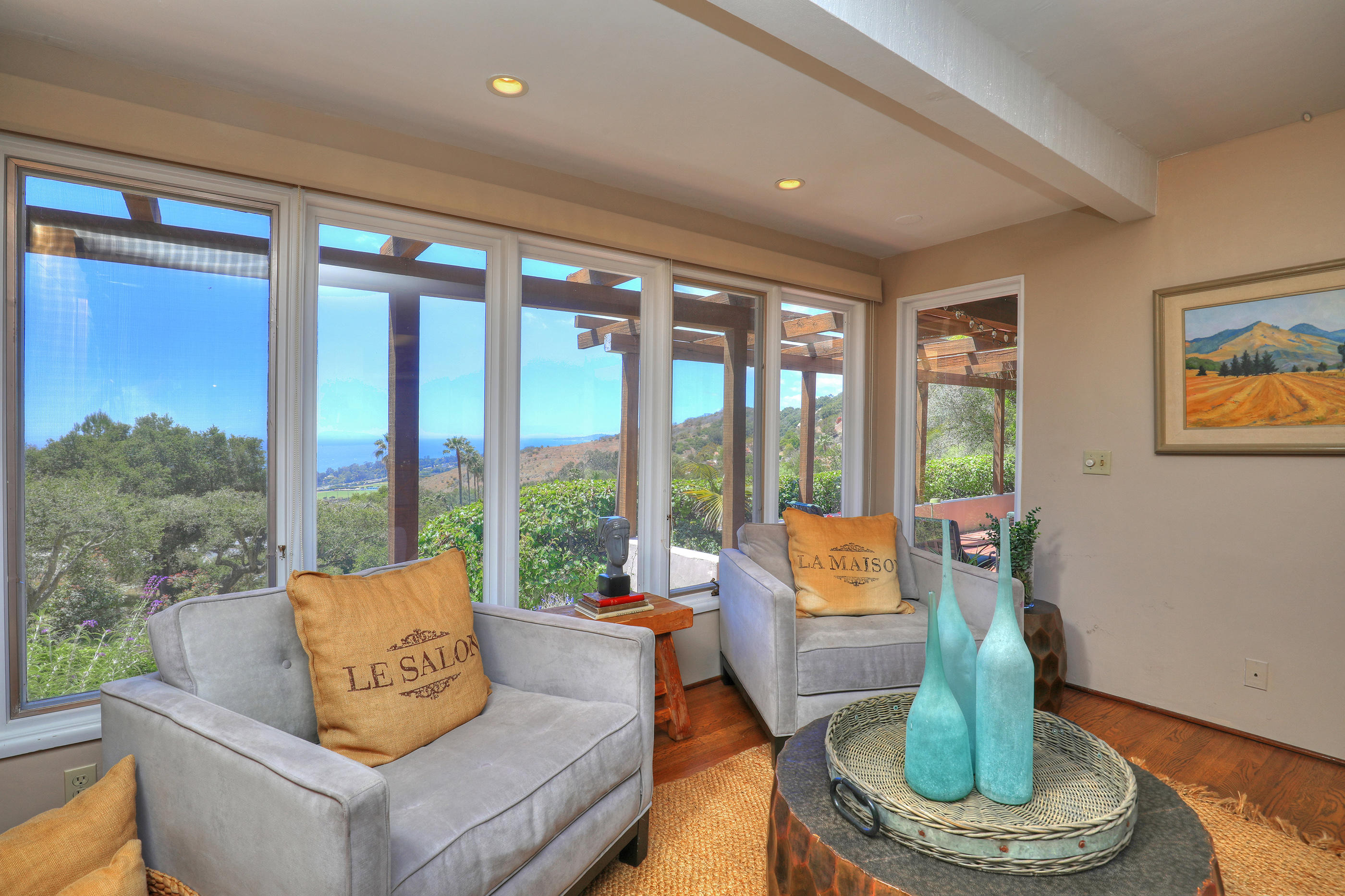 1986 Arriba Street Carpinteria, CA 93013 - Photo 15 of 35 a living room with furniture and a large window