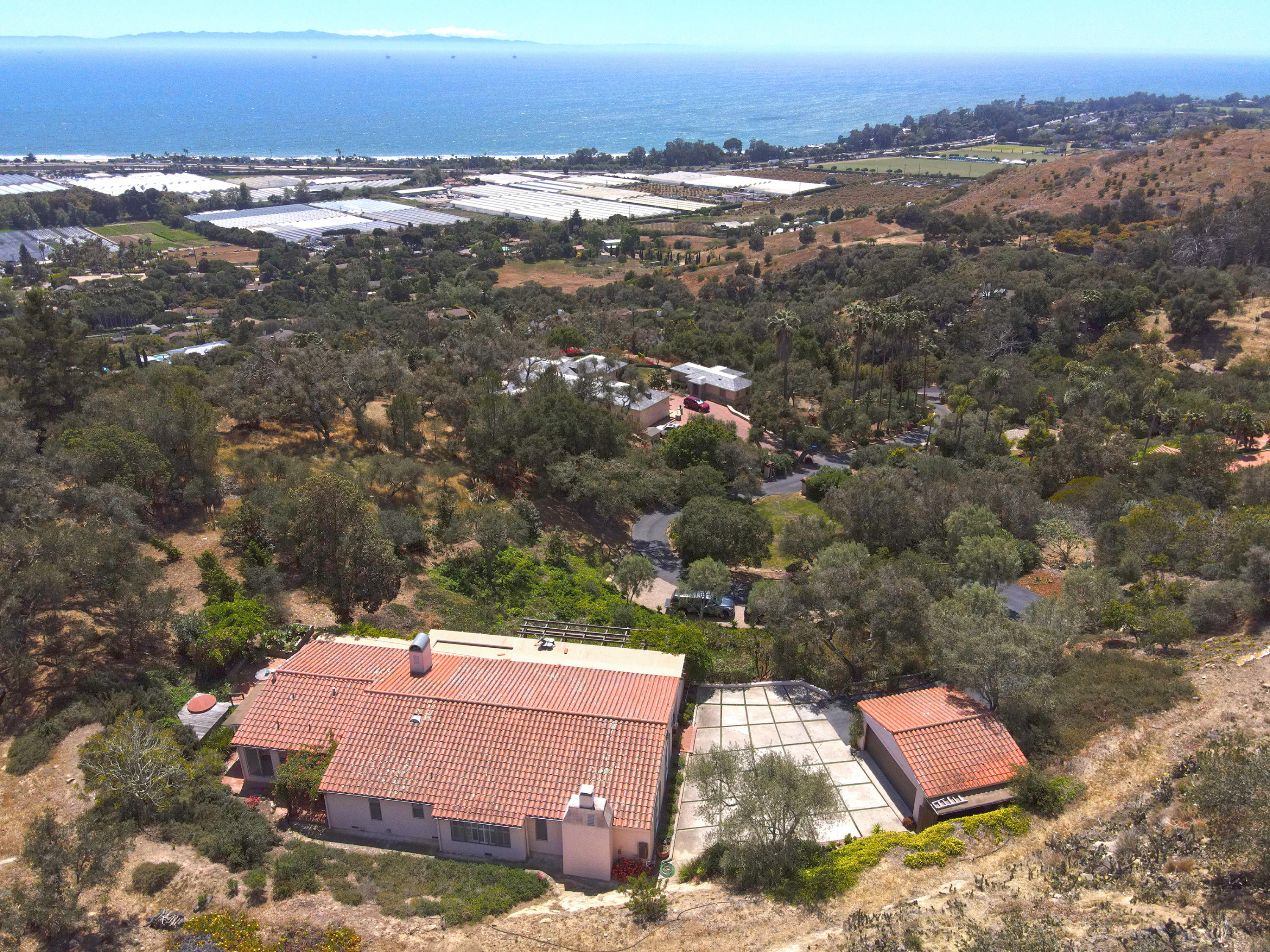 1986 Arriba Street Carpinteria, CA 93013 - Photo 2 of 35 an aerial view of residential houses with outdoor space