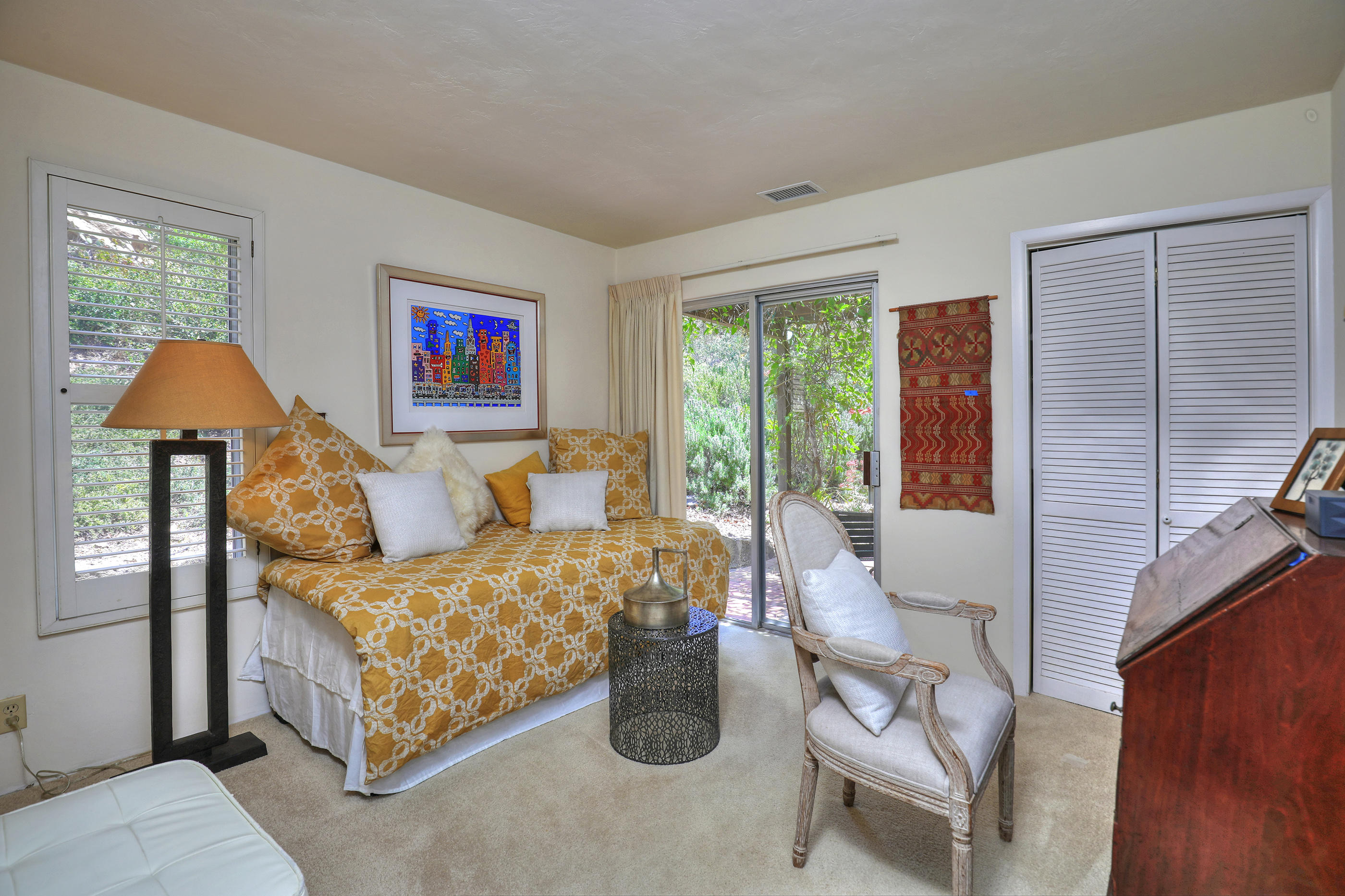 1986 Arriba Street Carpinteria, CA 93013 - Photo 23 of 35 a bedroom with furniture and a window