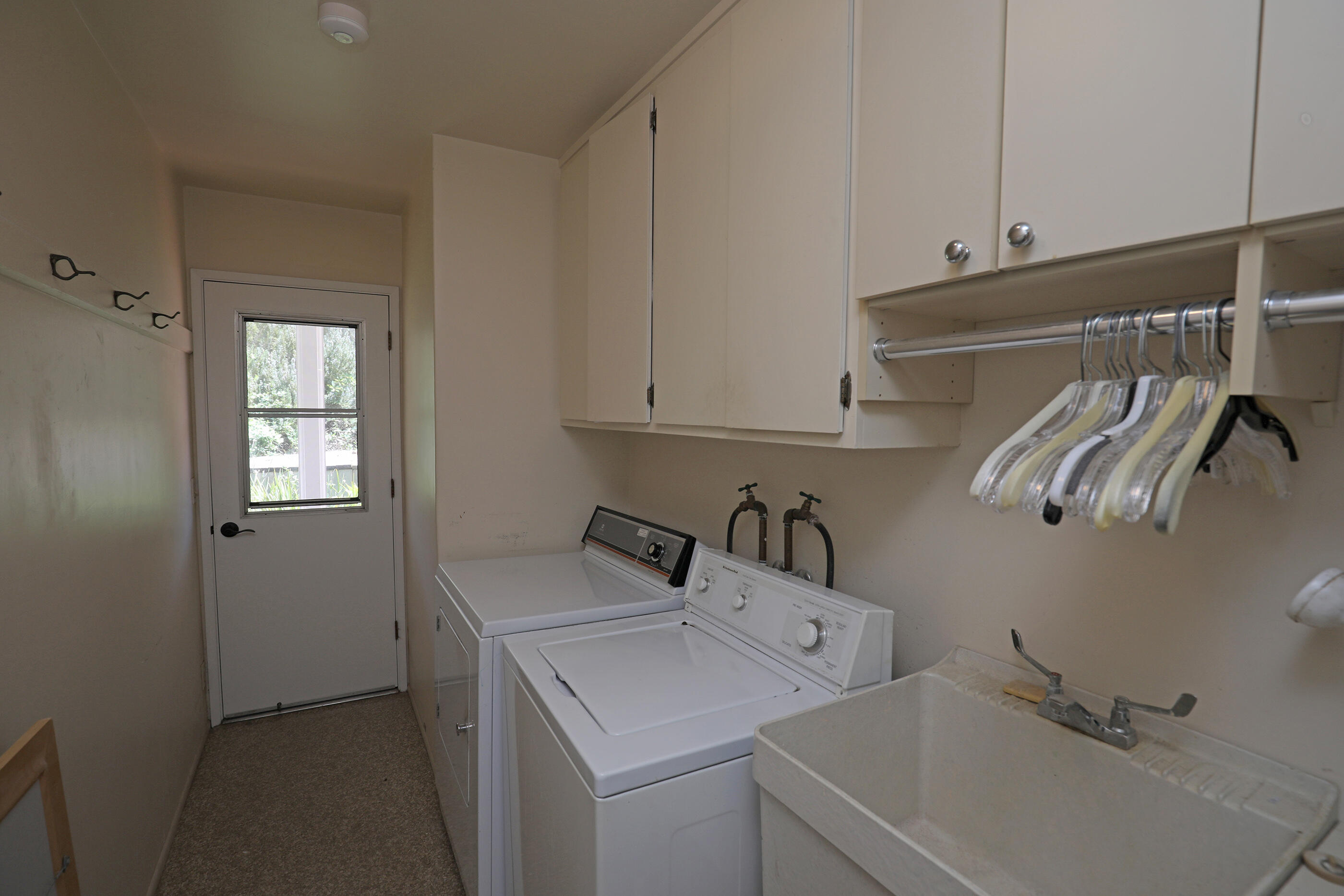 1986 Arriba Street Carpinteria, CA 93013 - Photo 24 of 35 a view of storage and utility room with racks on the wall