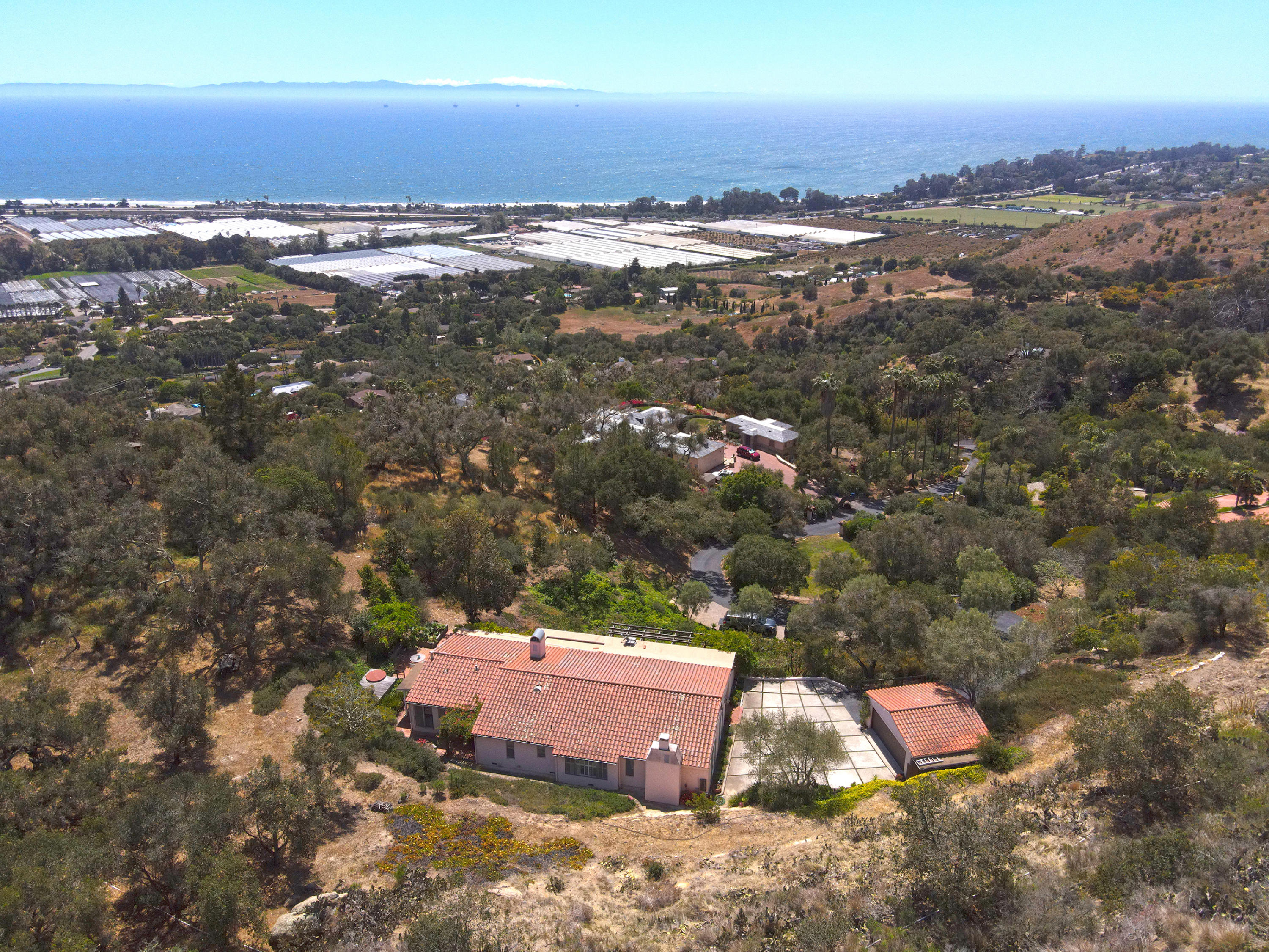 1986 Arriba Street Carpinteria, CA 93013 - Photo 4 of 35 an aerial view of residential houses with outdoor space