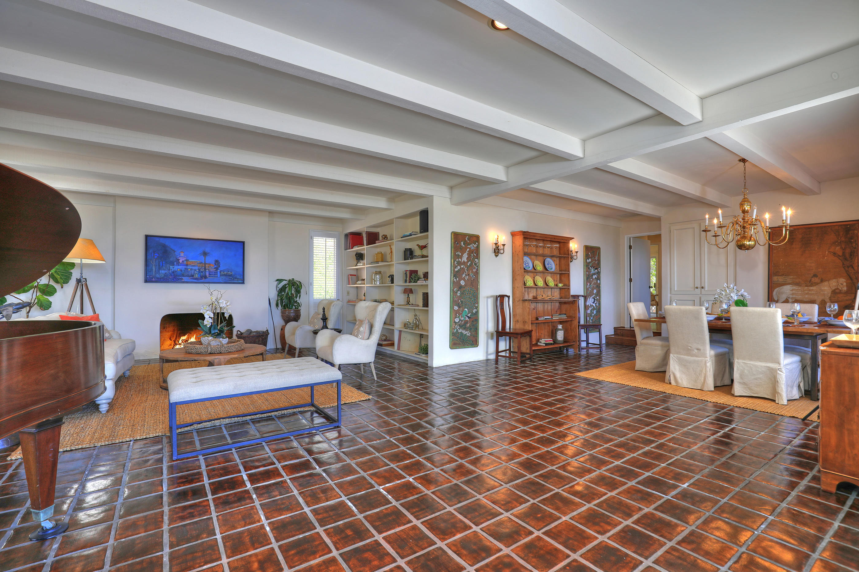 1986 Arriba Street Carpinteria, CA 93013 - Photo 6 of 35 a living room with furniture a wooden floor and next to a window