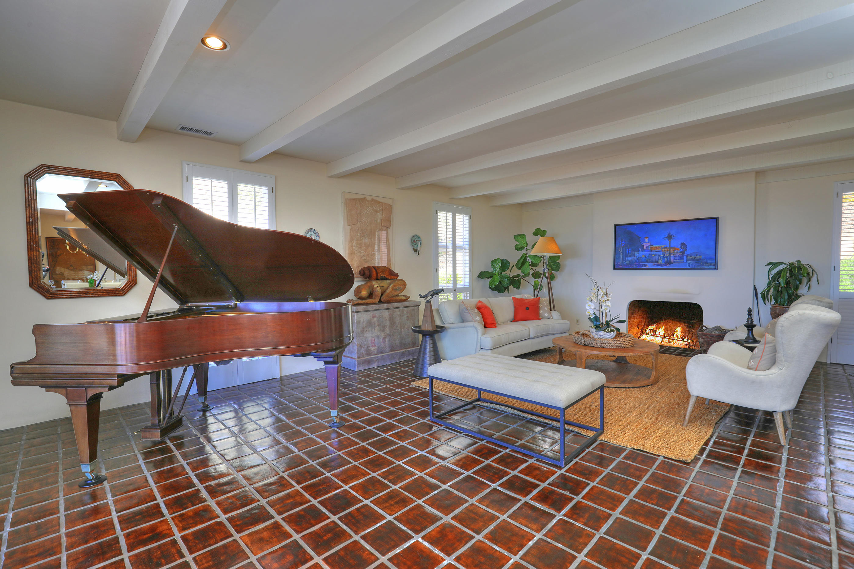 1986 Arriba Street Carpinteria, CA 93013 - Photo 8 of 35 a living room with furniture a table and a potted plant